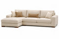Divano angolare in tessuto beige con chaise longue e cuscini